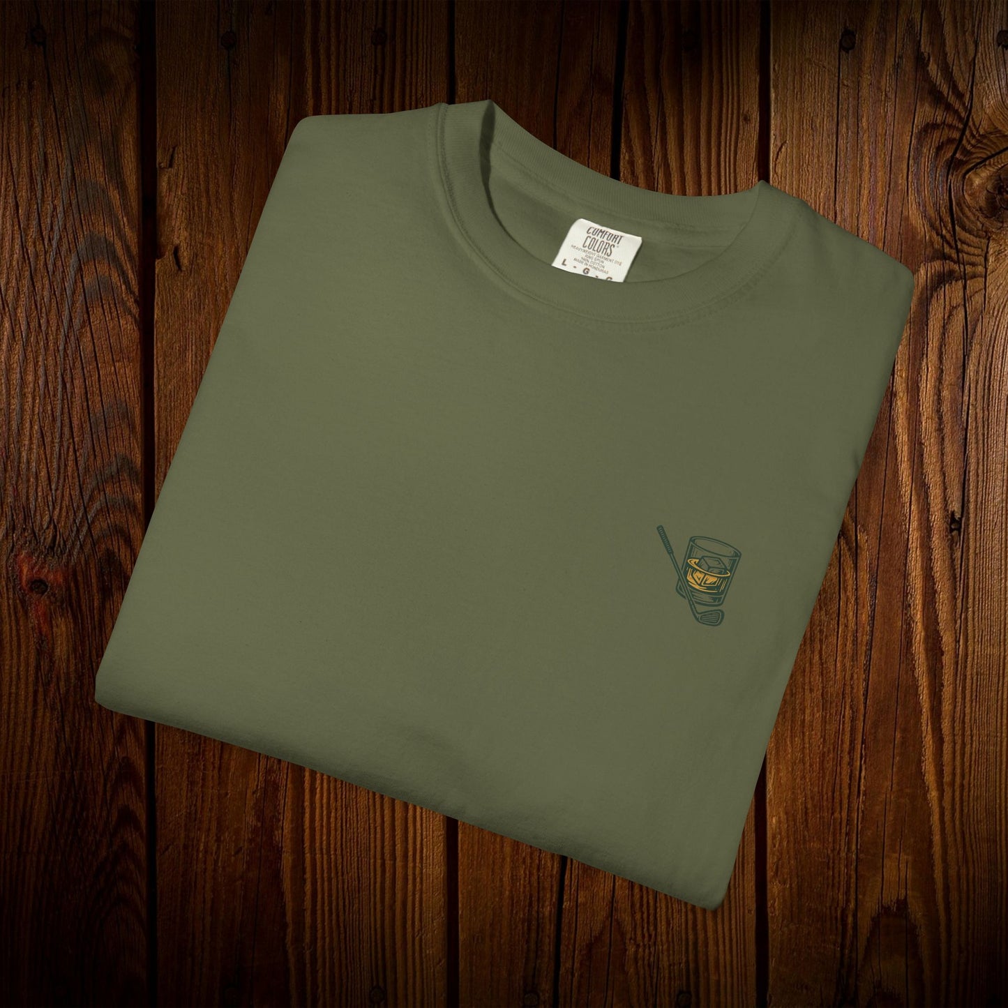 Men's Golf & Whiskey Tee featuring a stylish green design with a whiskey glass graphic, made from soft cotton and supporting eco-friendly practices.