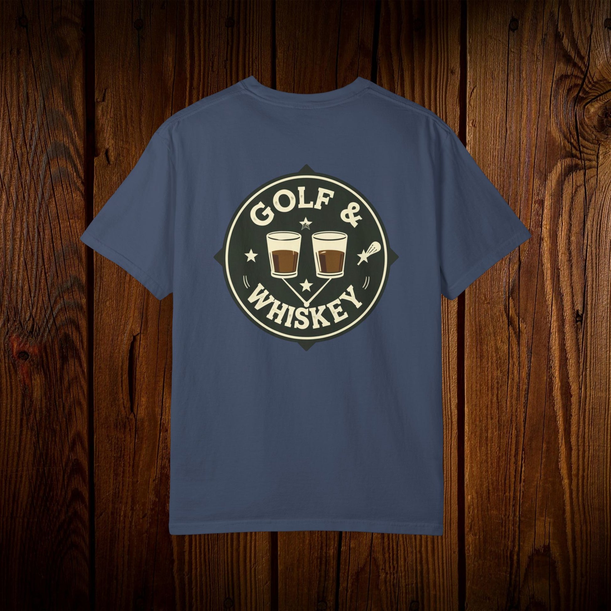 Men's Golf & Whiskey Tee showcasing a stylish back design with two whiskey glasses and golf elements on a blue shirt, perfect for golf lovers who enjoy whiskey.