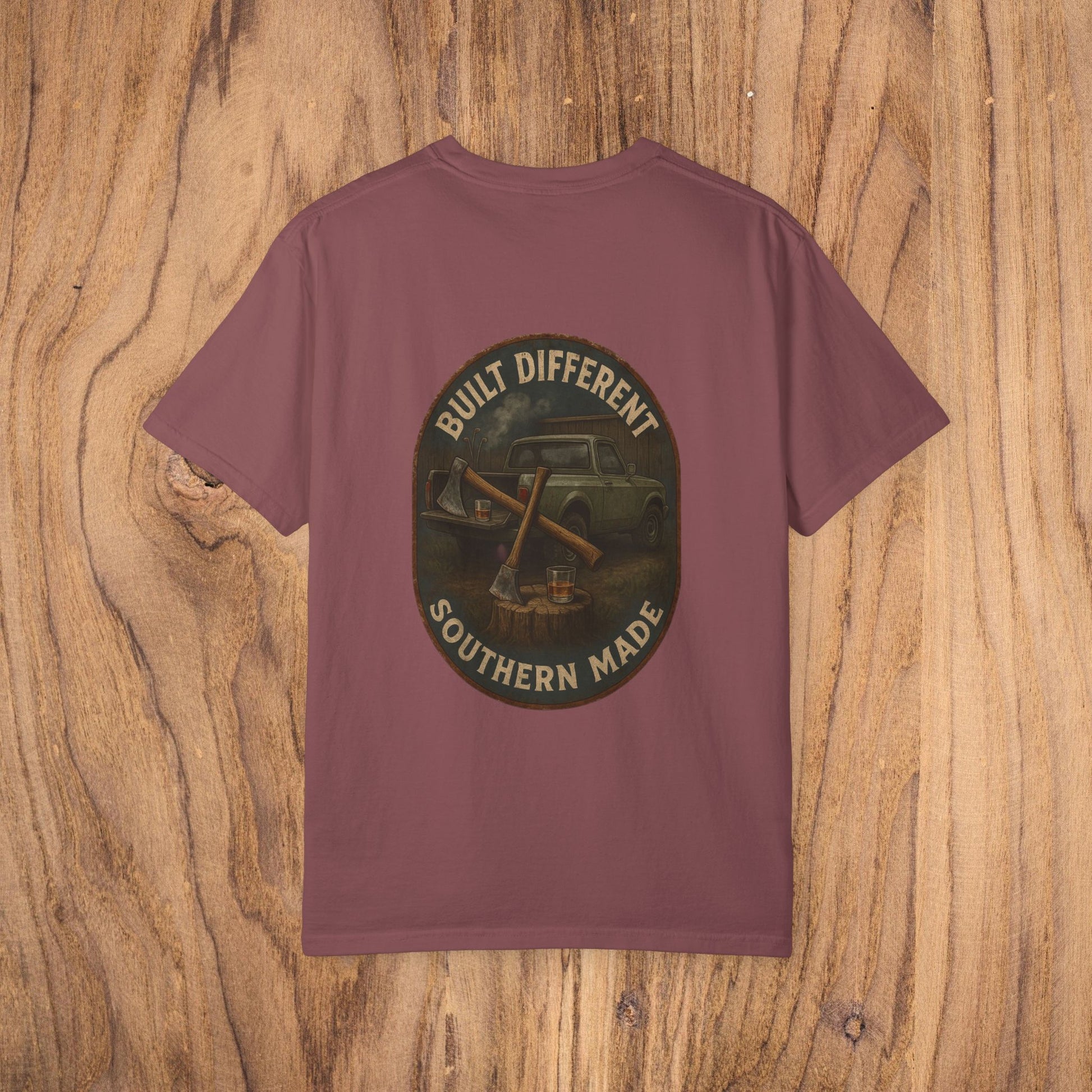 The back view of a Premium Southern Made T-Shirt featuring the slogan 'BUILT DIFFERENT SOUTHERN MADE' on a maroon shirt.