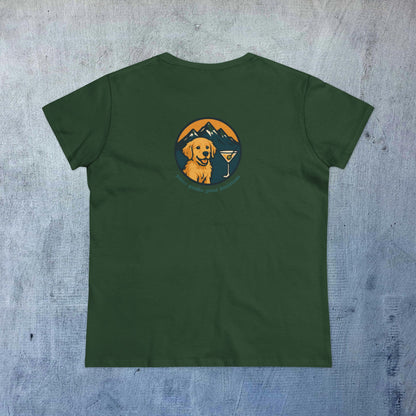 Back view of a green Unisex Dog Lover T-Shirt featuring a playful dog graphic against a mountainous backdrop, perfect for casual outings.