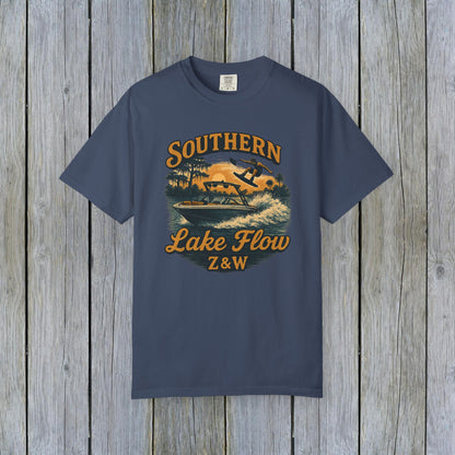 Southern Lake Flow T-Shirt in navy blue, showcasing a stylish illustration of water skiing, crafted from sustainable 100% US cotton, offered in various sizes from S to 4XL.