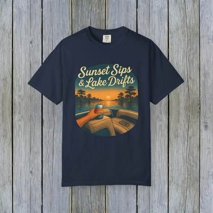 Lake Drifts T-Shirt in navy blue featuring an illustration of a drink at sunset, a perfect addition to your outdoor wardrobe.