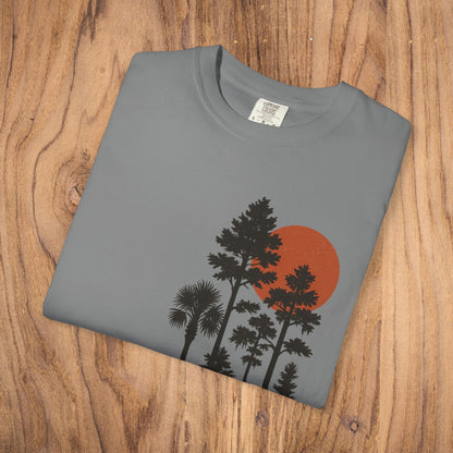 Folded view of the Sunset Trees Unisex T-Shirt featuring a beautiful sunset graphic with trees, made from soft 100% cotton for comfort.