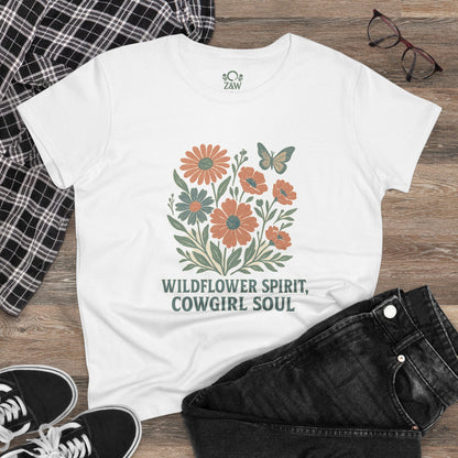 Styled Wildflower Spirit Cotton Tee in white with floral artwork and 'Wildflower Spirit, Cowgirl Soul' text, paired with jeans and accessories for a trendy outfit.