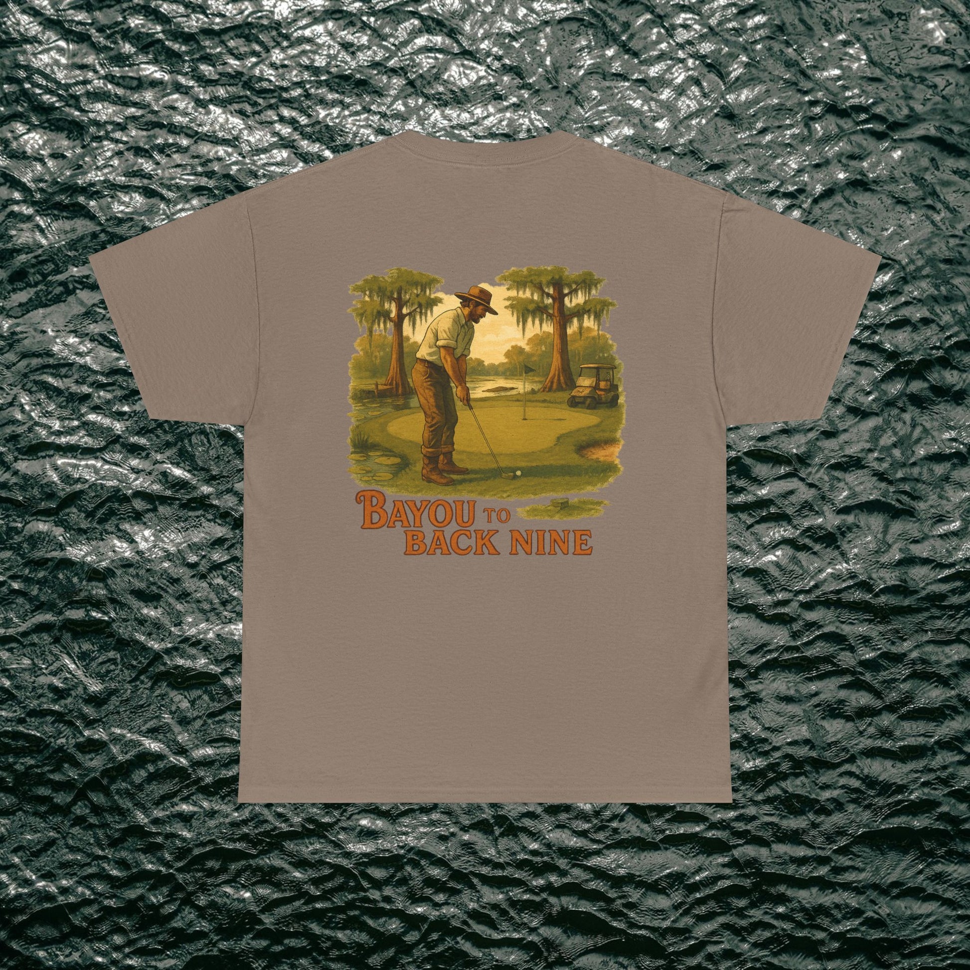 Bayou To Back Nine Softstyle Golf Tee displaying a nostalgic golf-themed print on a beige t-shirt, perfect for casual wear and leisure activities.