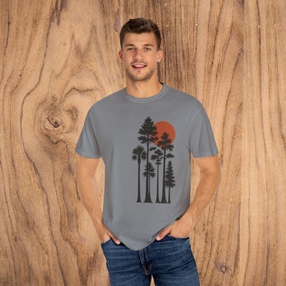 Model wearing the Sunset Trees Unisex T-Shirt, showcasing a relaxed fit and sunset tree design, ideal for casual outings.