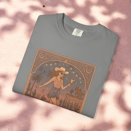 Line Dancer Tarot Tee in gray color, displaying a creative design of a dancing girl surrounded by desert motifs, crafted from soft cotton and ethically made.