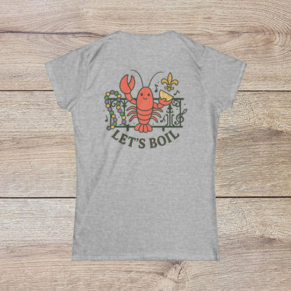 Crawfish Boil Shirt for Women in gray, displaying a fun lobster design and 'LET'S BOIL' text. Ideal for vibrant summer gatherings and NOLA celebrations.