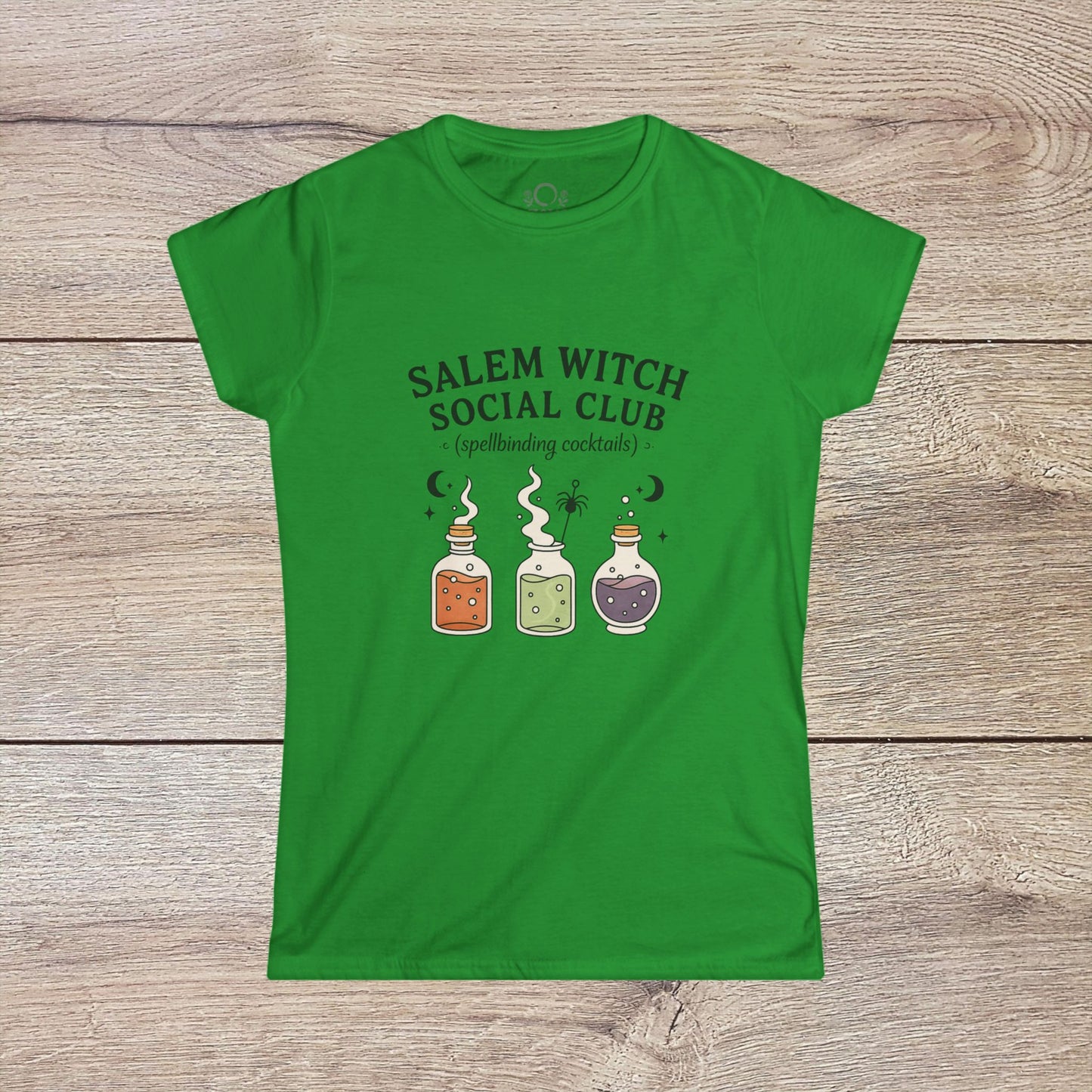 Salem Witch Social Club Graphic Tee featuring charming potion bottles and spellbinding cocktails design on a green background, crafted from 100% ring-spun cotton for a comfortable fit.
