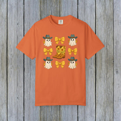 Cute Halloween T-Shirt showcasing cheerful ghosts in cowboy hats with stylish cowboy boots and yellow bows, ideal for all genders, crafted from eco-friendly fabric.