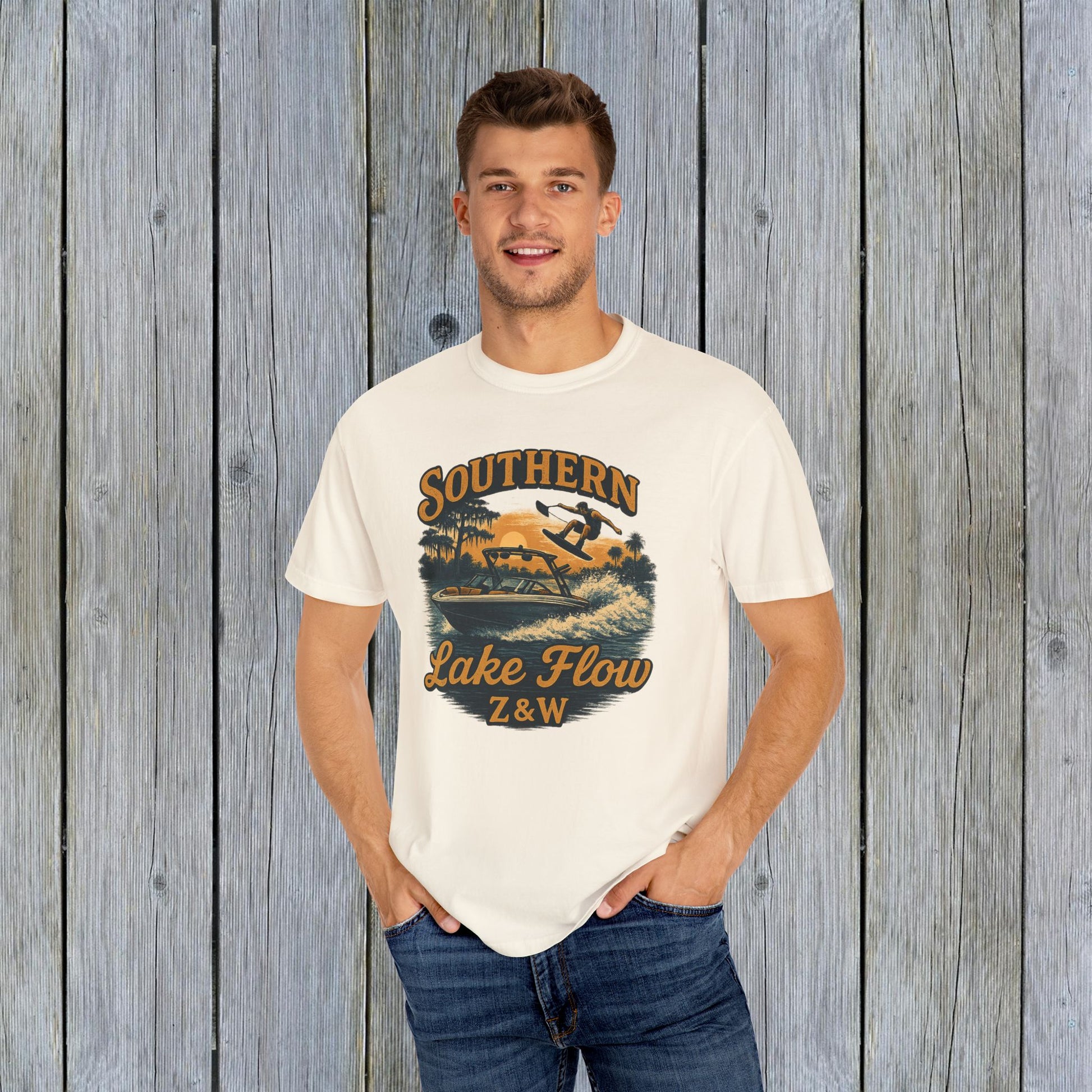 Man wearing Southern Lake Flow T-Shirt in cream color, made of eco-friendly 100% US cotton. Perfect for showcasing a love for lakes and casual versatility.