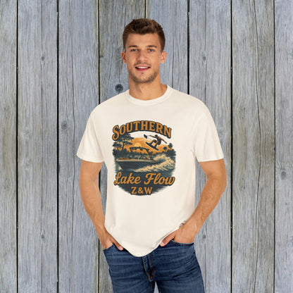 Man wearing Southern Lake Flow T-Shirt in cream color, made of eco-friendly 100% US cotton. Perfect for showcasing a love for lakes and casual versatility.