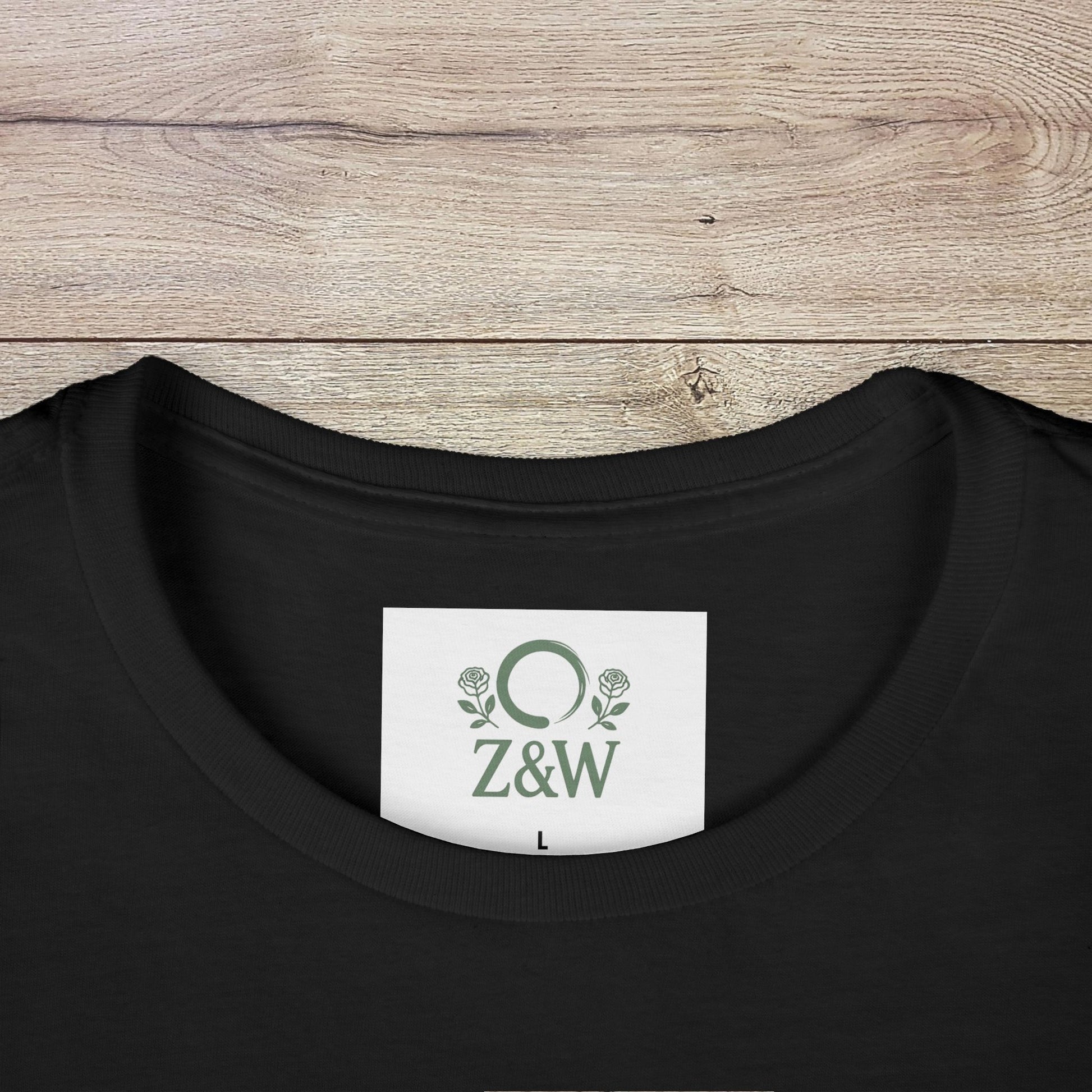 Close-up of the neckline label of the black Sippin' Through The Seasons Slim Fit Tee, displaying the Z&W logo and size details.