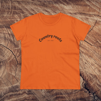 Country Roots Cowgirl Tee in bright orange, featuring a trendy 'Country roots' logo, perfect for a fashionable yet relaxed outfit.