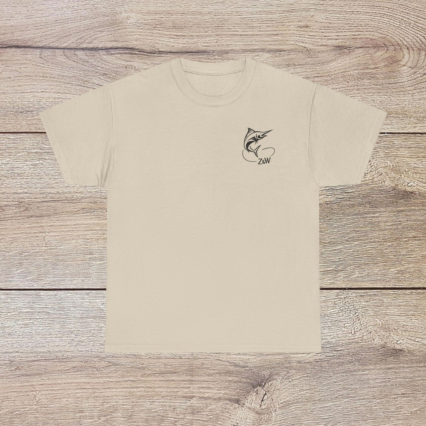 Fishing Adventure Tee - Unisex Heavy Cotton Shirt for Nature Lovers, showcased in a natural beige color with a marlin design, ideal for fishing trips and outdoor activities.