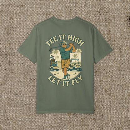 The Tee It High Let It Fly Graphic Tee in an olive green color with an eye-catching golfer graphic on the back, suitable for various occasions.