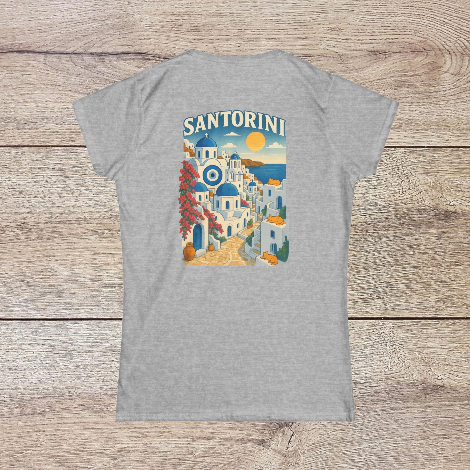 Back view of the Santorini Tee in grey, showcasing an artistic depiction of Santorini's iconic buildings and sunset, crafted from eco-friendly materials.