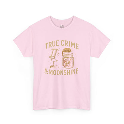 True Crime & Moonshine Unisex Graphic Tee in soft pink featuring a vintage design with a microphone and a jar, perfect for casual wear for true crime lovers.