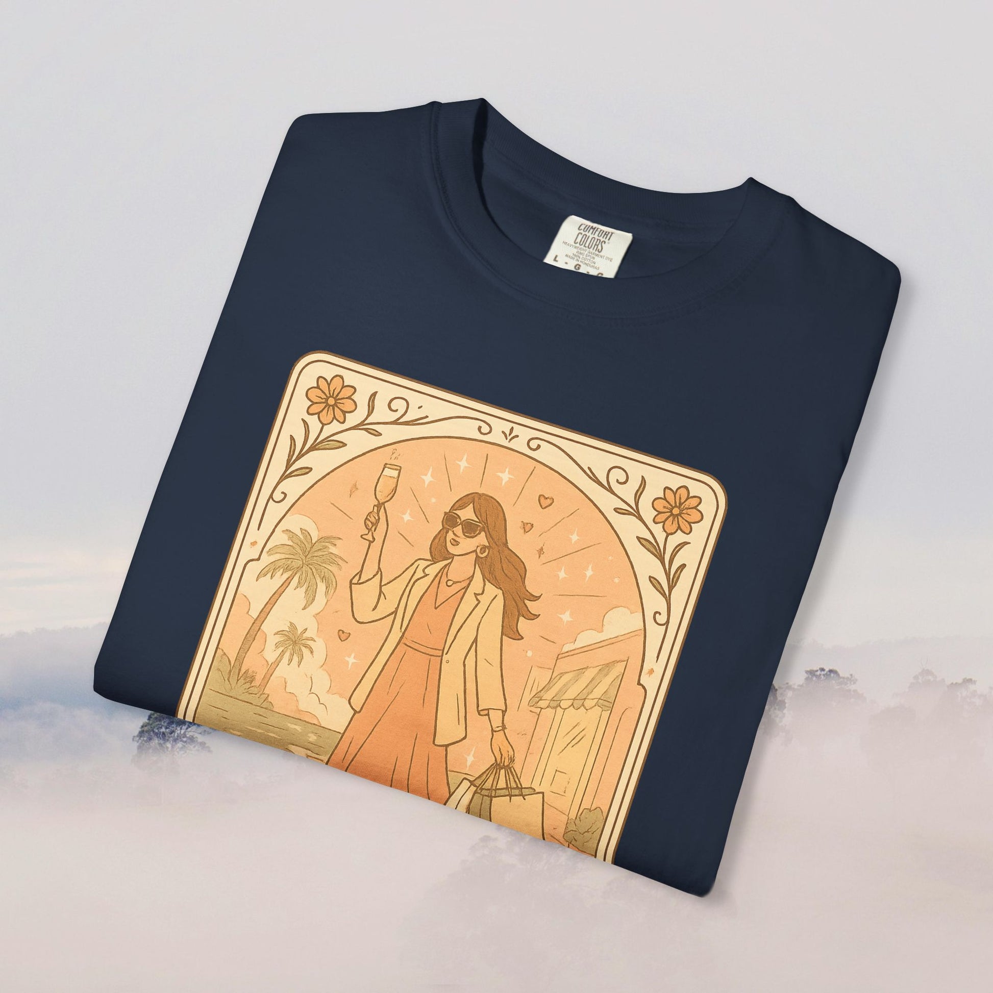 Brunch Babe Tarot Graphic Tee in navy blue, depicting a trendy woman with a drink, great for everyday looks, composed of 100% cotton for softness.