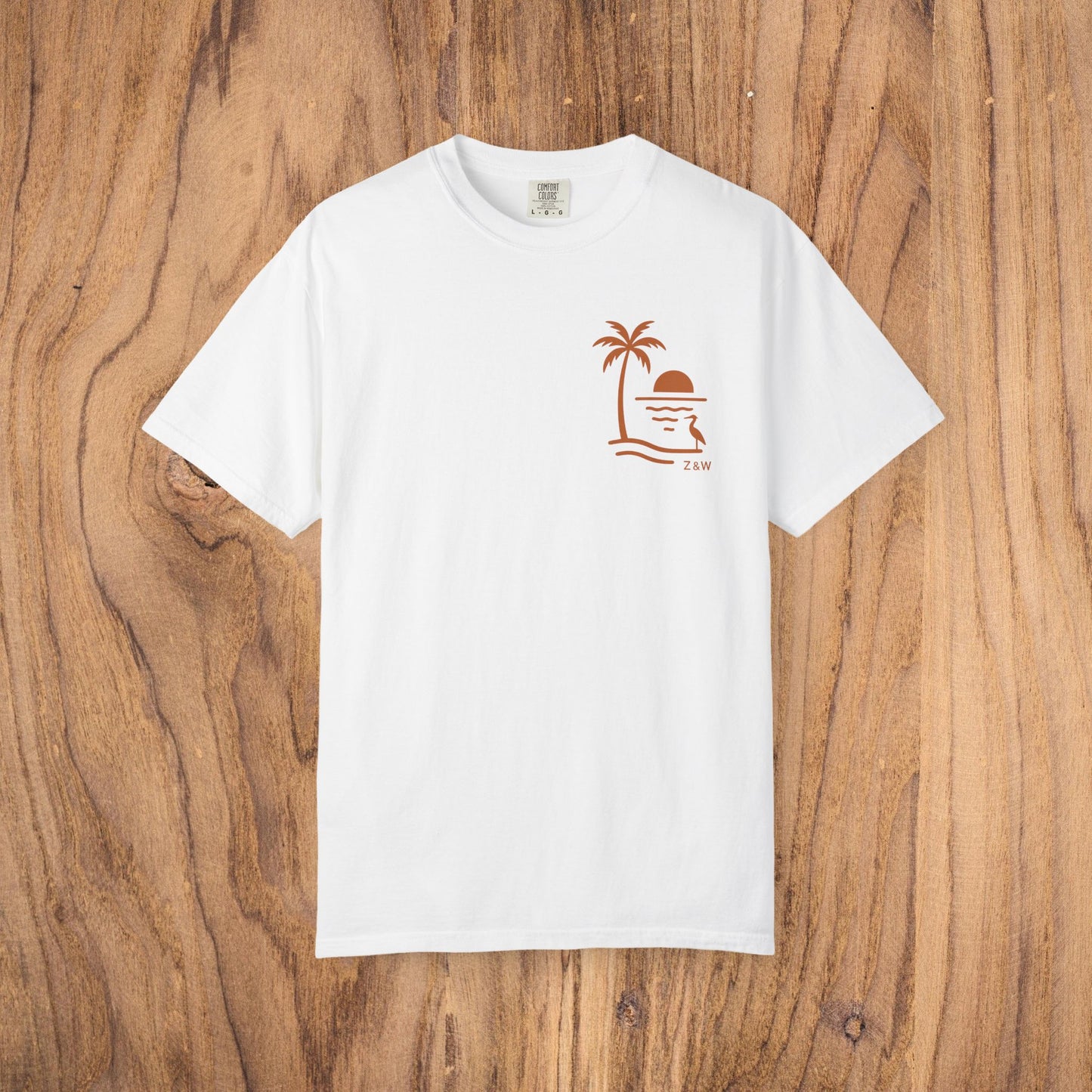 Unisex Sunset Palm Tree T-Shirt in classic white - vibrant garment-dyed cotton tee for men and women, a versatile wardrobe staple.