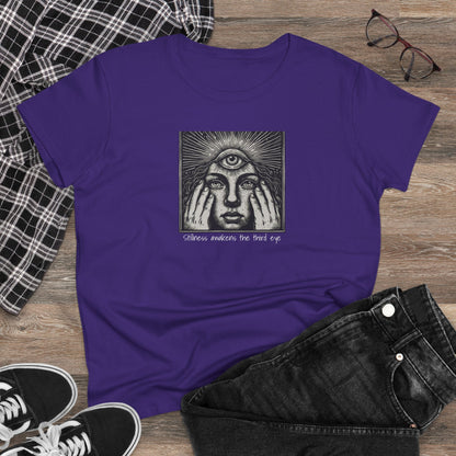 Stylish Third Eye Graphic Tee casually styled on a wooden surface next to plaid fabric and sneakers, showcasing its trendy cropped fit and distinctive third eye design.