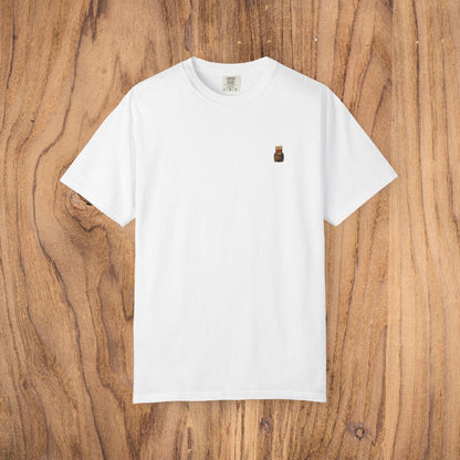 Premium Southern Made T-Shirt displayed on a wooden background, showcasing its classic white color suitable for stylish casual wear.