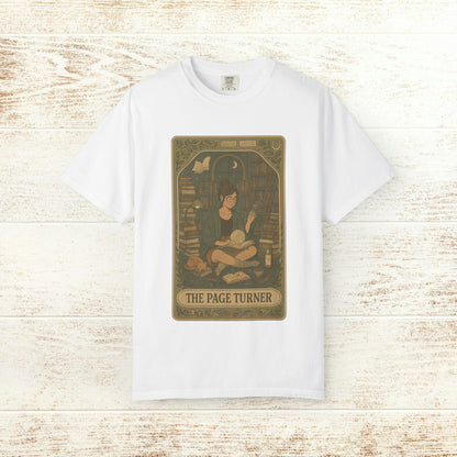Page Turner Tarot Tee - A classic white soft cotton t-shirt showcasing a charming design of a book lover immersed in reading, offered in sizes S to 4XL.