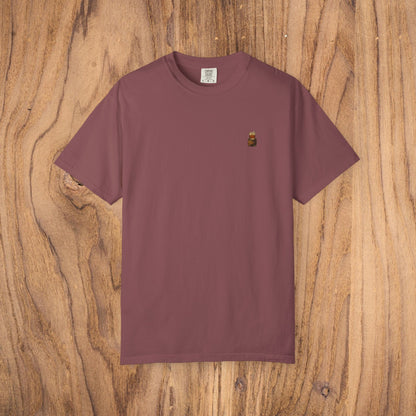 Premium Southern Made T-Shirt featured in a rich burgundy color set against a wooden backdrop, perfect for stylish casual wear.