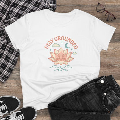 Stay Grounded Spiritual Tee with a vibrant lotus graphic on a cozy white crop top, styled with dark jeans and a plaid shirt, perfect for casual wear.