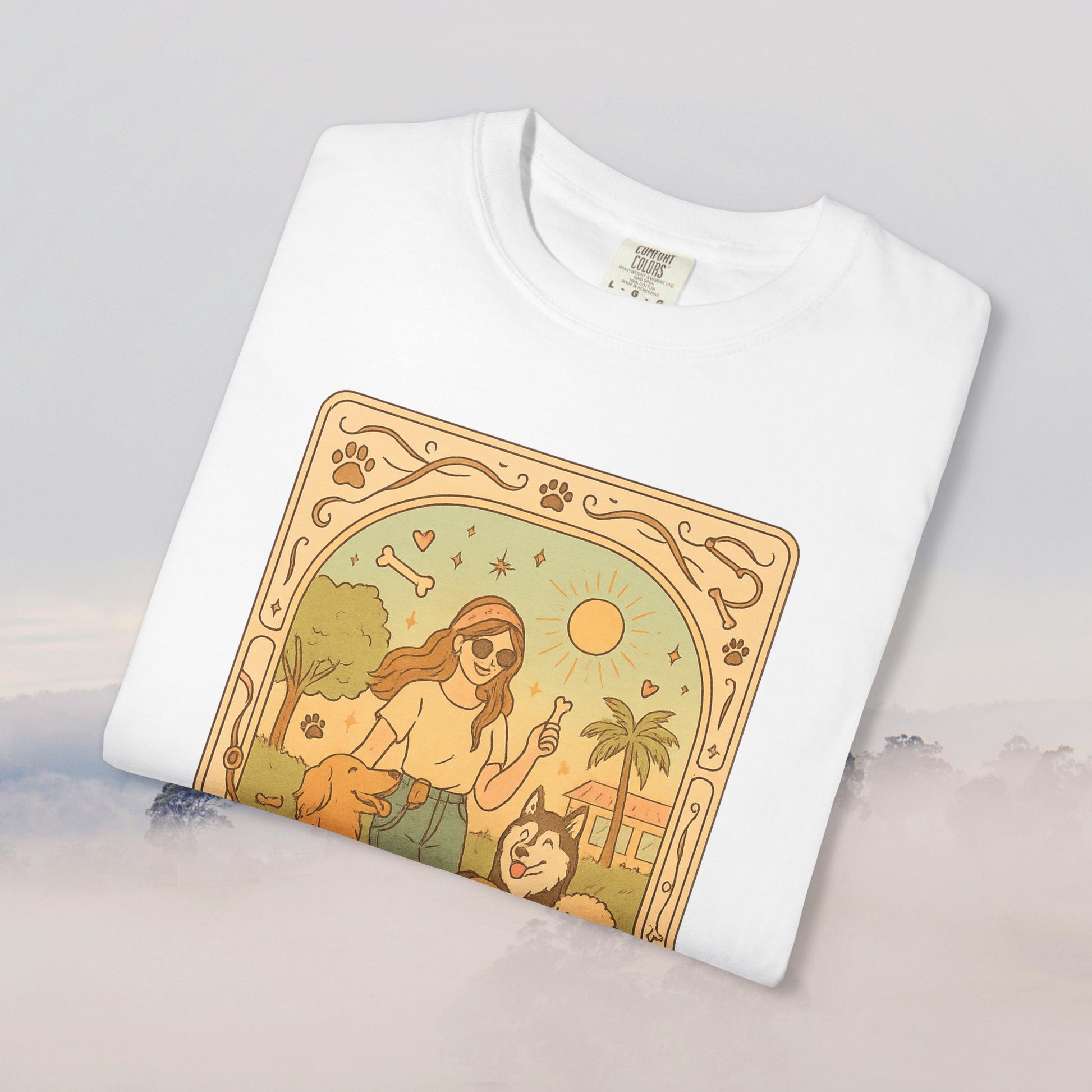Animal Lover Tarot Tee in classic white, showcasing a whimsical illustration of a person with dogs and sunny elements, crafted from 100% cotton and designed for comfort.