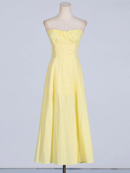Elegant Trendy Slit Sleeveless Midi Dress with Zip Back in yellow shown from a stylish front angle, showcasing its flowing skirt and modal design.