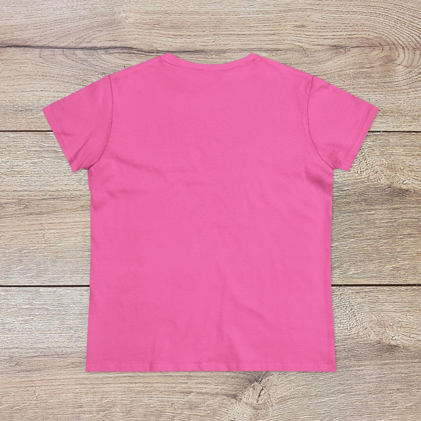 Back view of the Wine Not Tee in a soft pink shade, emphasizing its comfortable and casual style.