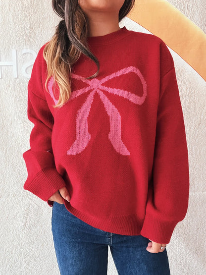 Close-up of the red Stylish Bow Pattern Casual Long Sleeve Sweater for Effortless Everyday Wear, emphasizing its unique bow motif and comfortable fit.