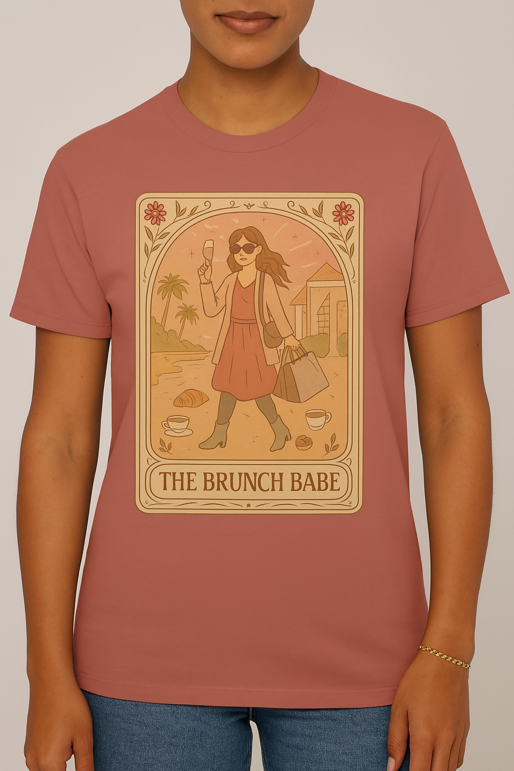 Brunch Babe Tarot Graphic Tee modeled by a woman, showcasing a stylish design with warm colors, perfect for casual fashion lovers.