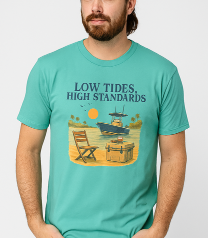 Man wearing a Garment-Dyed Low Tides High Standards T-Shirt in turquoise, featuring a boat and beach chair design, perfect for a relaxed summer vibe.
