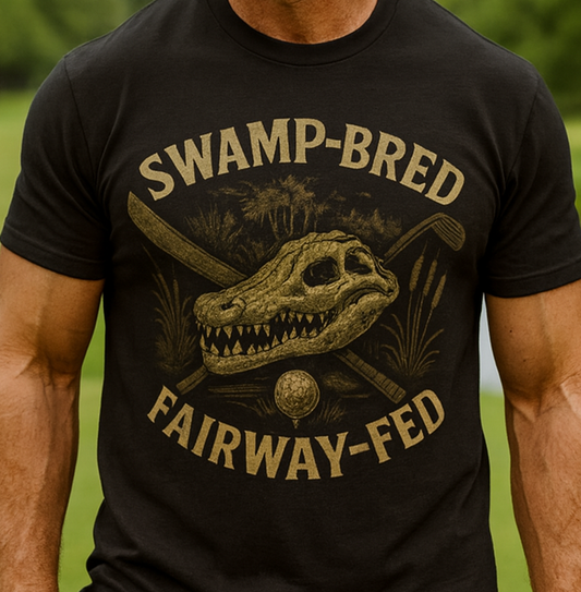Unisex Swamp-Bred Fairway-Fed Tee featuring a striking graphic of a skull with crossed golf clubs, perfect for golf enthusiasts and casual wear. Made from 100% pre-shrunk US cotton, this durable tee showcases a unique design while ensuring comfort and style in sizes S-4XL.