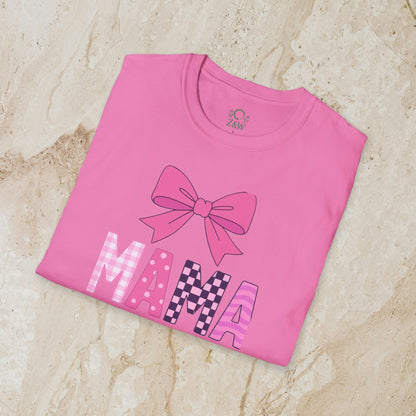 Mama Bow Tee in bright pink color, featuring a large colorful bow graphic and bold letters spelling 'MAMA', crafted from seamless 100% cotton.