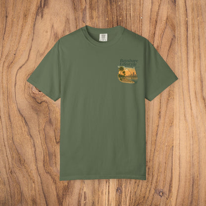 Bayshore Lifestyle Tee in olive green color, showcasing a trendy palm tree graphic on soft, lightweight cotton fabric, perfect for casual wear.