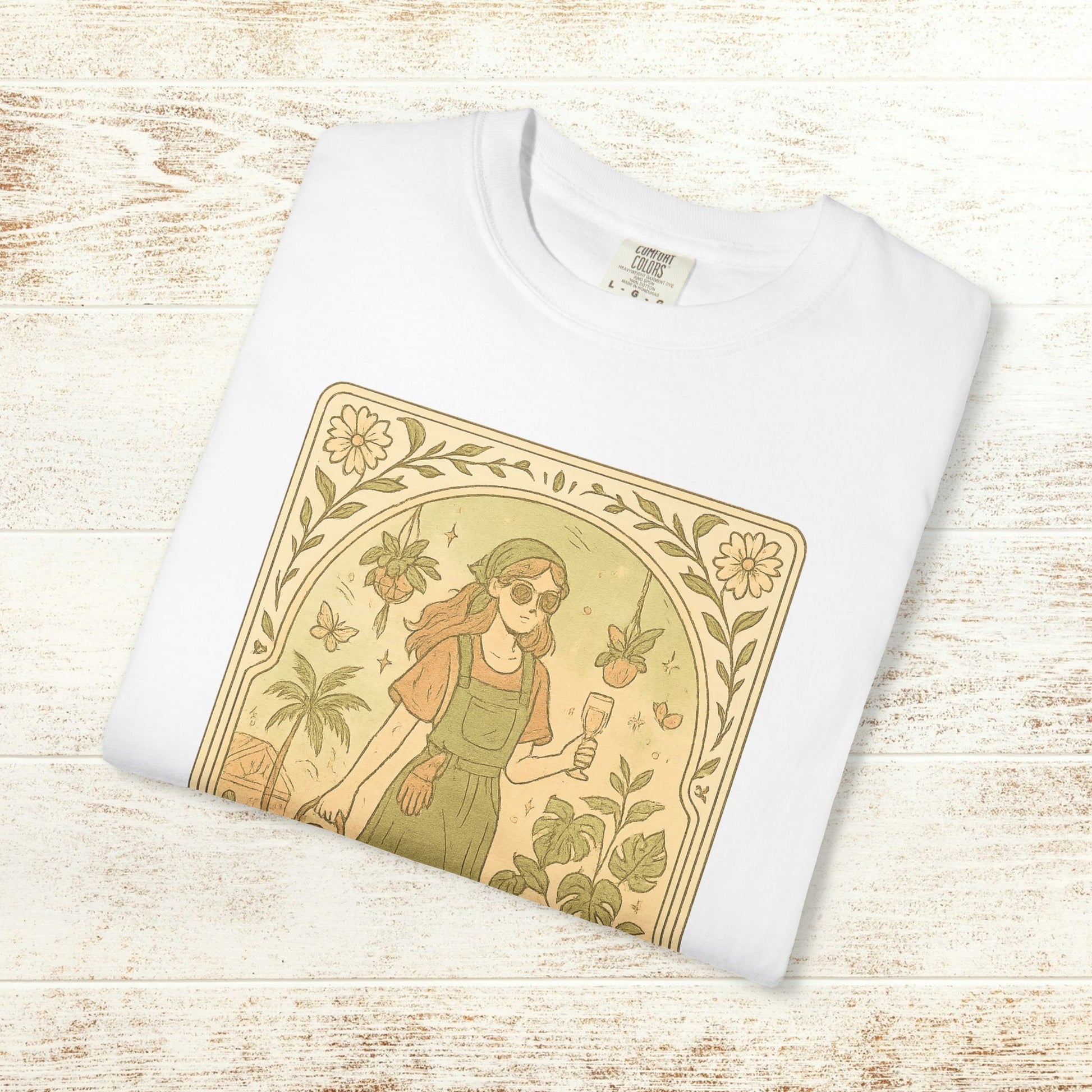Rooted One Tarot Tee in classic white, featuring a delightful design of a girl surrounded by flora and fauna, crafted from ethically sourced cotton, offered in sizes S-4XL.