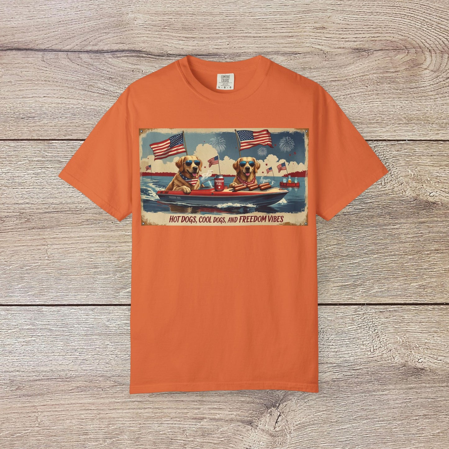 Men's Golden Tee: Comfortable Cotton T-Shirt with Ribbed Collar, featuring an orange background with playful graphics of dogs in a boat celebrating freedom with flags.
