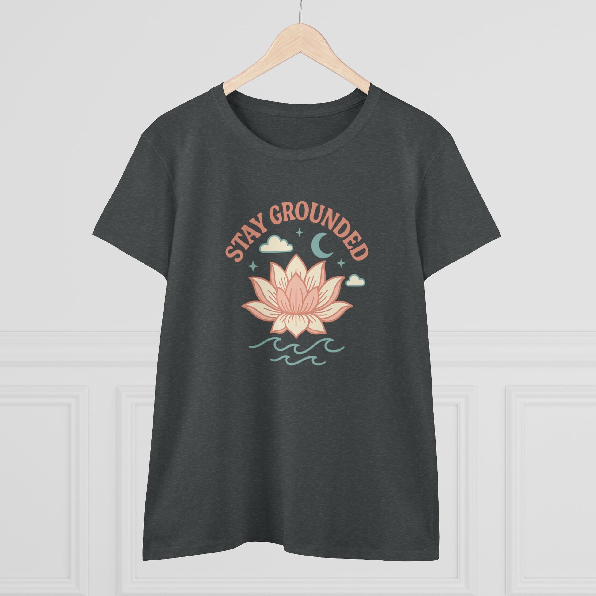 Front view of Stay Grounded Spiritual Tee featuring a lotus design, ideal for warm weather festivals and casual days, showcased in a modern setting.