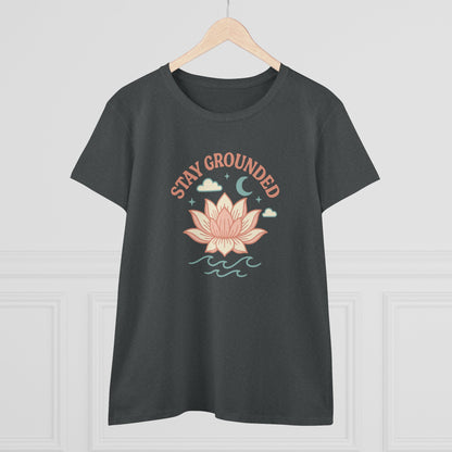 Front view of Stay Grounded Spiritual Tee featuring a lotus design, ideal for warm weather festivals and casual days, showcased in a modern setting.