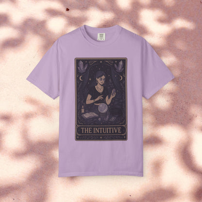 Intuitive Tarot Tee on a soft pastel background, highlighting the unique garment-dyed design and tarot imagery, suitable for casual and mystical fashion enthusiasts.