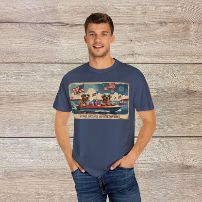 Men's Golden Tee: Comfortable cotton t-shirt modeled by a man in navy blue, featuring a charming illustration of dogs on a boat, perfect for relaxed summer days.