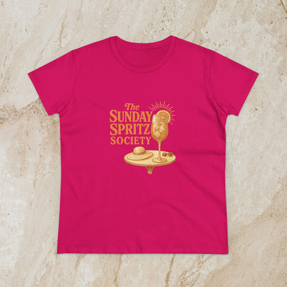 Vibrant pink Women's Midweight Cotton Tee with 'The Sunday Spritz Society' graphic, perfect for adding a pop of color to your casual wardrobe.