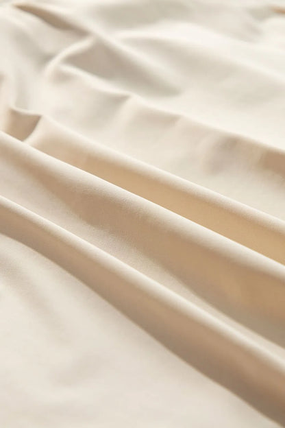 Detailed view of the fabric of the Drawstring High Waist Lined Active Skorts, displaying the soft, smooth texture ideal for active wear.