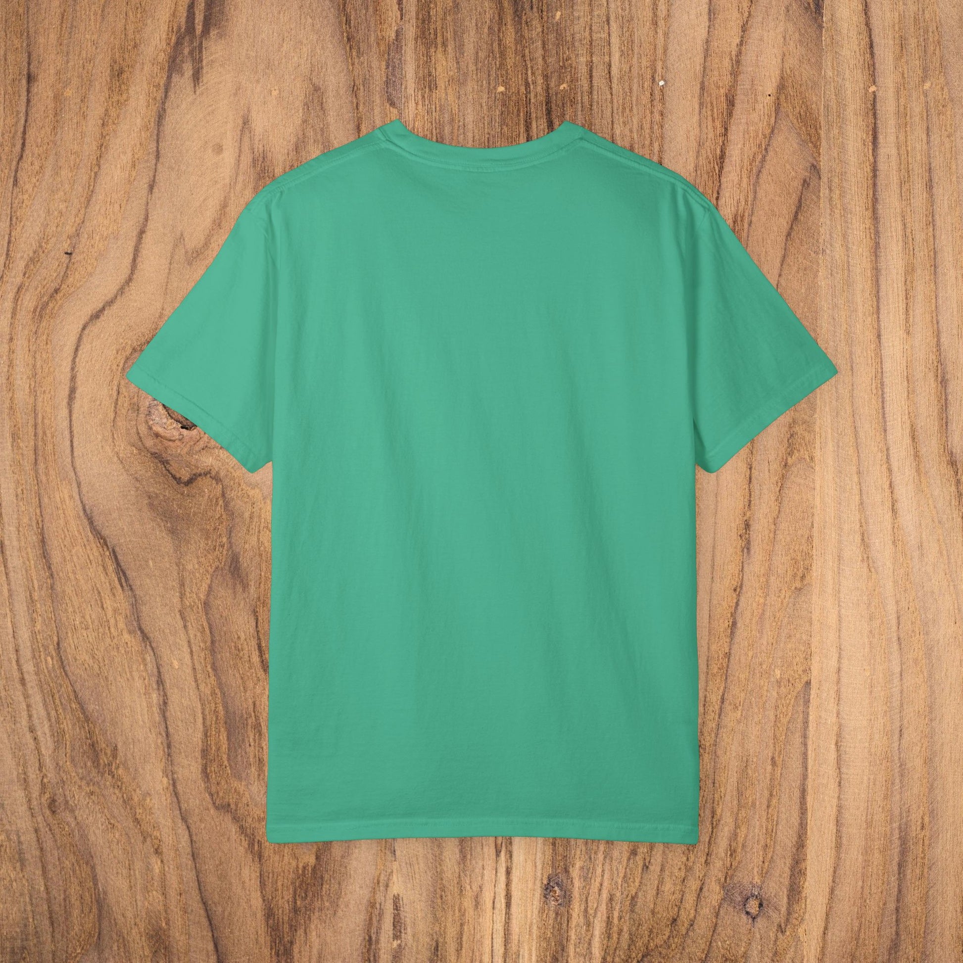 Back view of the Unisex Sunset Palm Tree T-Shirt in lively green, illustrating the premium quality fabric and relaxed fit, excellent for casual wear.