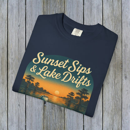 Folded Lake Drifts T-Shirt in navy blue showcasing an artistic sunset and lake graphic, perfect for casual wear or gifts.