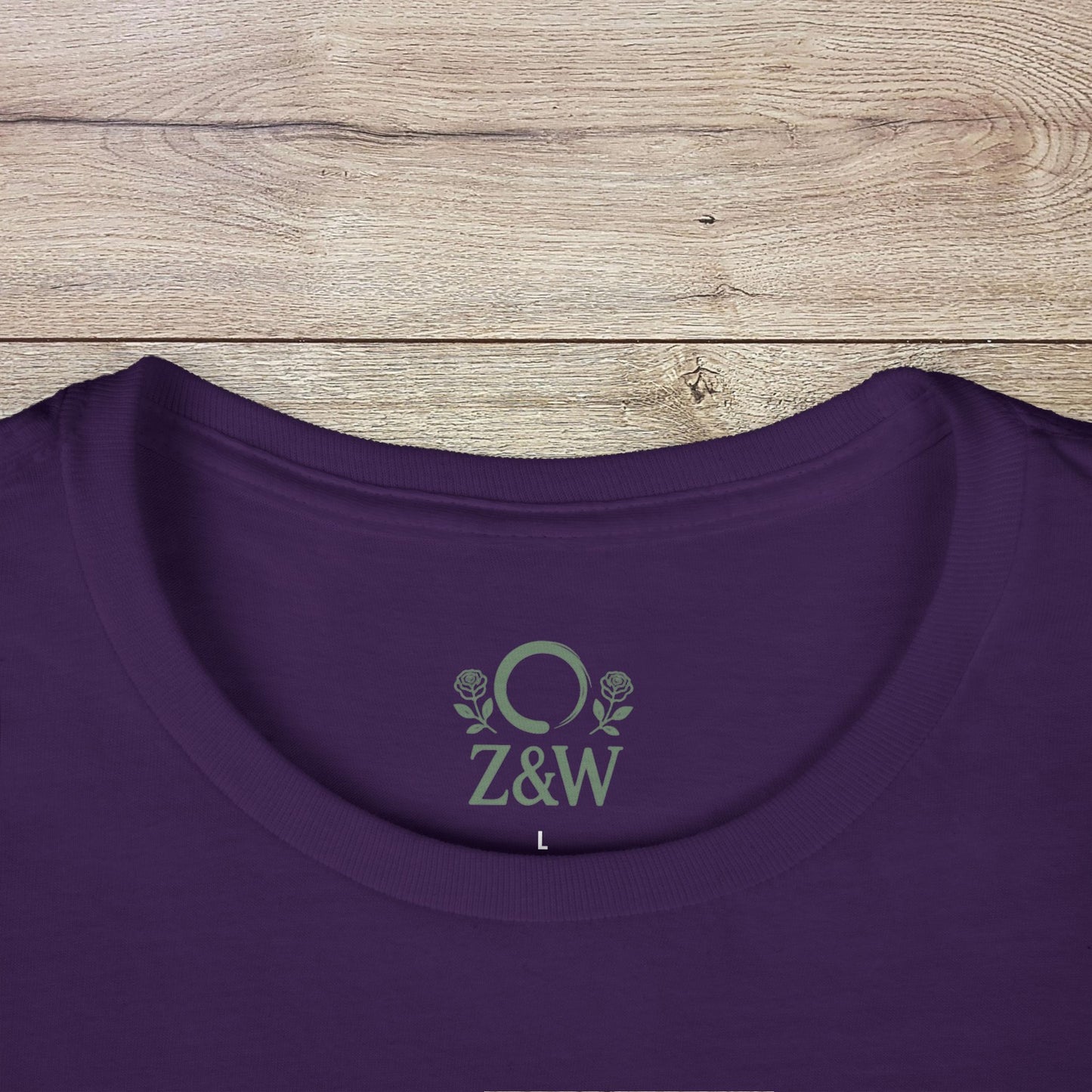 Crawfish Boil Shirt for Women - Close-up of the neckline and brand logo on a purple casual tee, stylish and comfortable for NOLA celebrations and seafood cookouts.