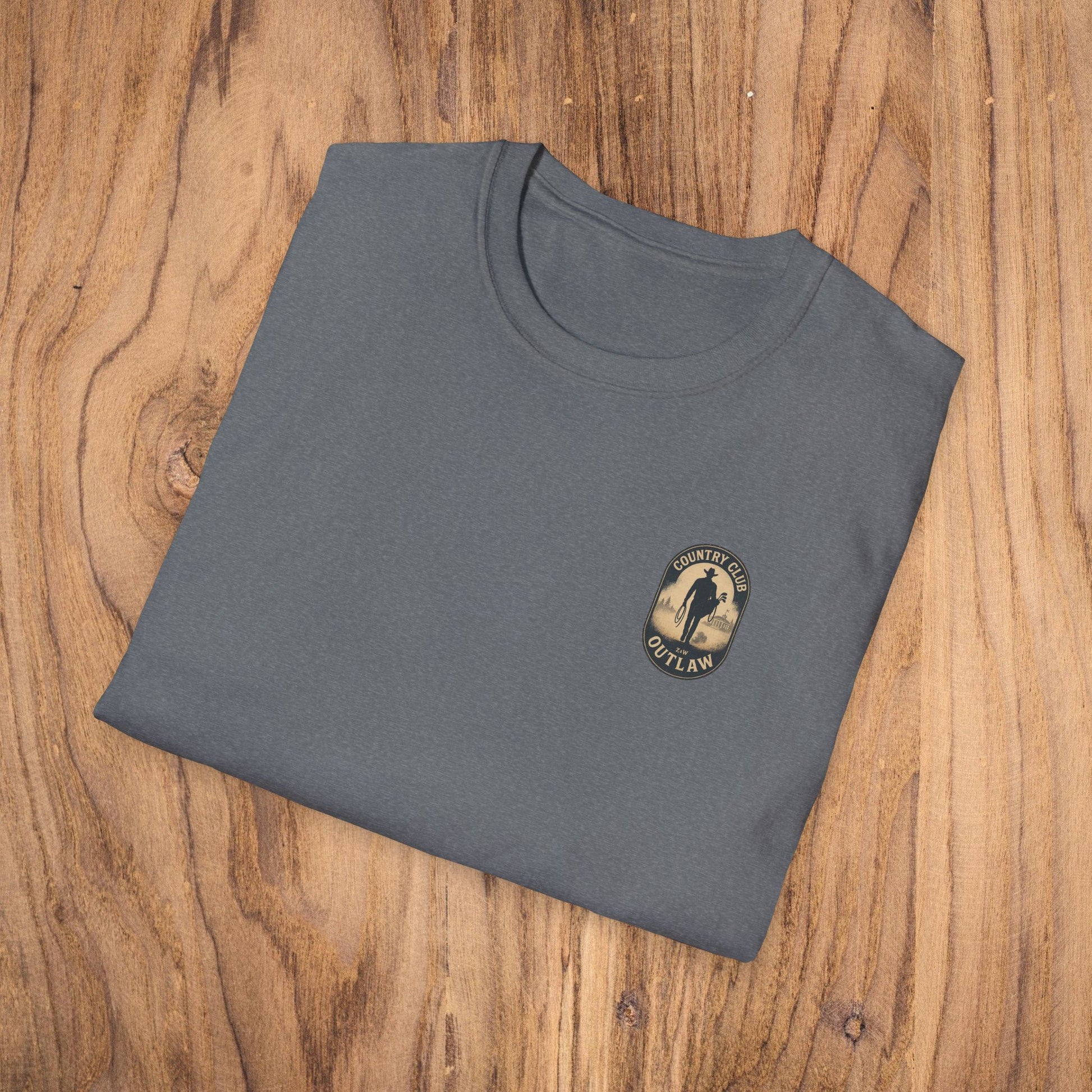 Folded Vintage Southern Gentleman Golf Shirt displaying the Country Club Outlaw logo. This classic fit tee is made from 100% cotton, ideal for stylish golfers.